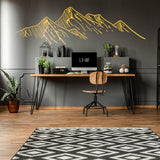 Mountain silhouette wall decal above a desk, adding a nature theme to a modern workspace.