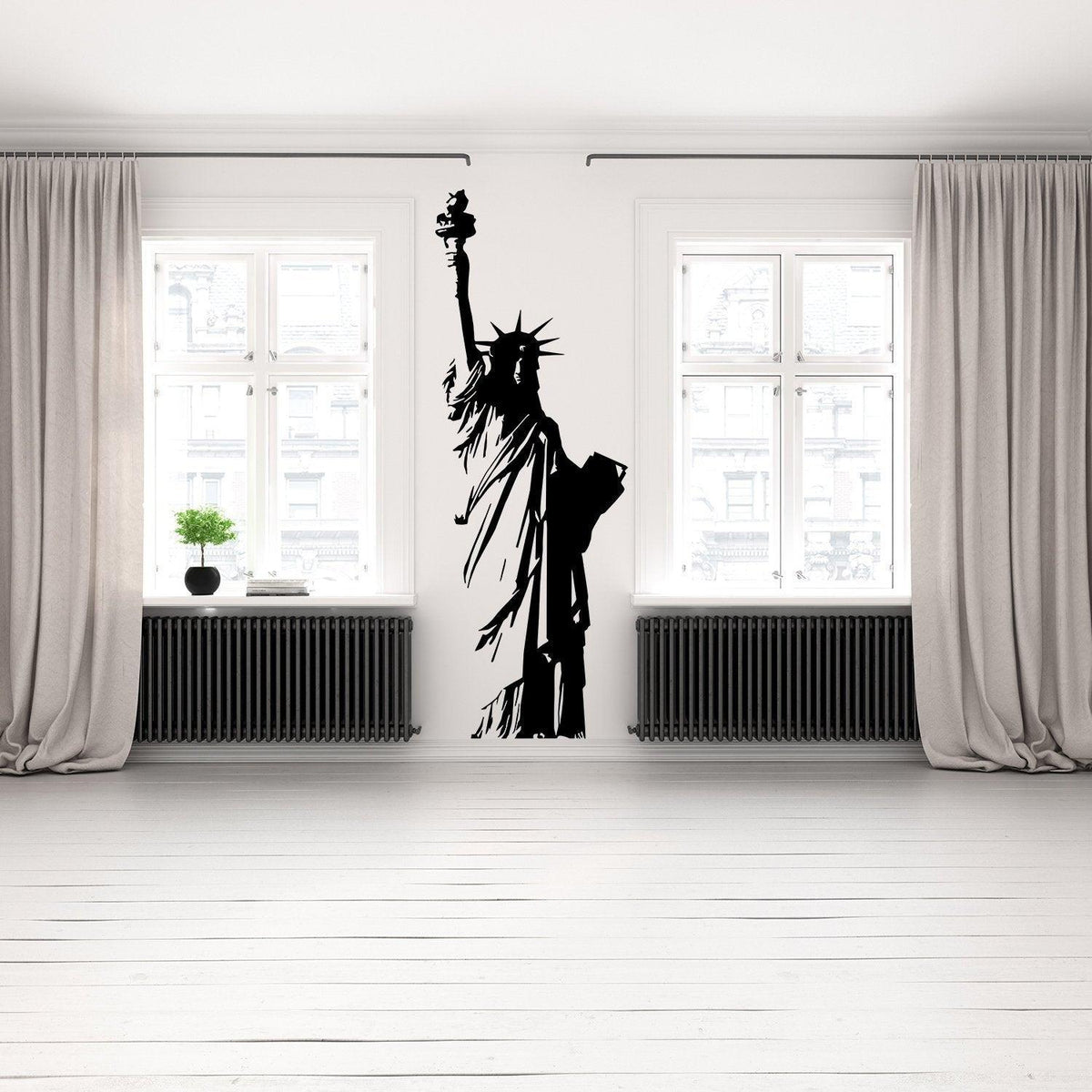 Statue of Liberty wall sticker in modern room, showcasing iconic Lady Liberty silhouette as home decor.