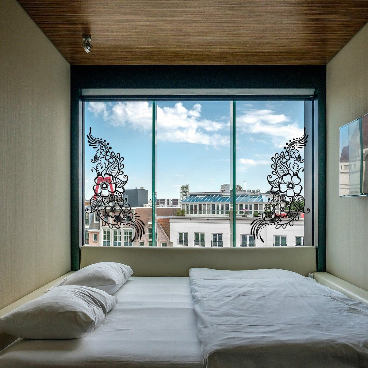 Henna tattoo wall vinyl sticker featuring floral mandala design on a bedroom window, enhancing modern decor.