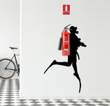 Silhouette of a scuba diver holding a fire extinguisher, wall sticker decor enhancing modern interior.