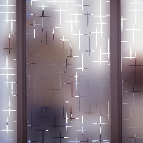 Frosted Film Wow Sticker on window, creating an elegant frosted glass effect with intricate design.