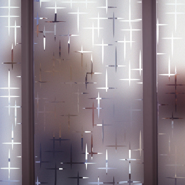 Frosted Film Wow Sticker on window, creating an elegant frosted glass effect with intricate design.