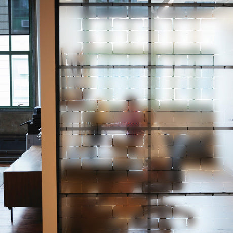 Frosted window vinyl decal creating a stylish and elegant frosted glass effect in an office space.