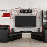 Stylish living room with a TV decorated by vinyl decals, featuring black furniture and modern sound system.
