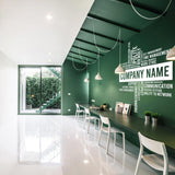 Modern office featuring a green wall with customizable business name vinyl sticker and sleek furniture.