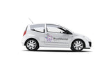 Custom business vehicle decal displayed on a white car.