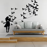 Kissing wall decal featuring a girl embracing a partner with flying birds.