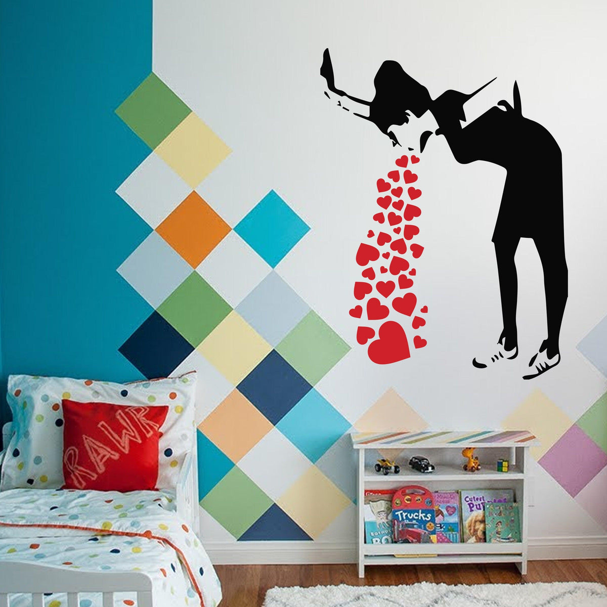 Street art style wall decal of girl spilling hearts.