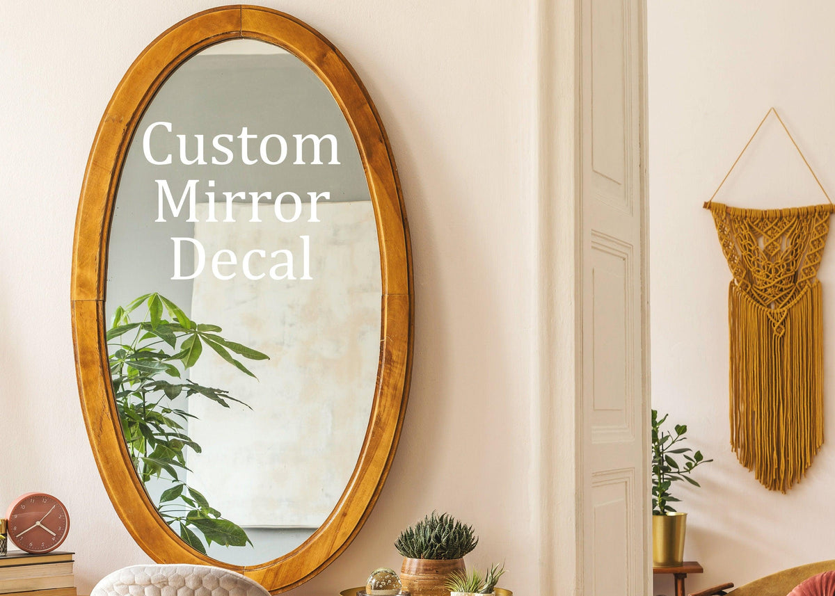 Elegant custom mirror decal showcased in a stylish living room setting, enhancing mirror aesthetics.