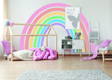 Pastel rainbow adhesive wall sticker in a cozy nursery, brightening up the space with playful colors.