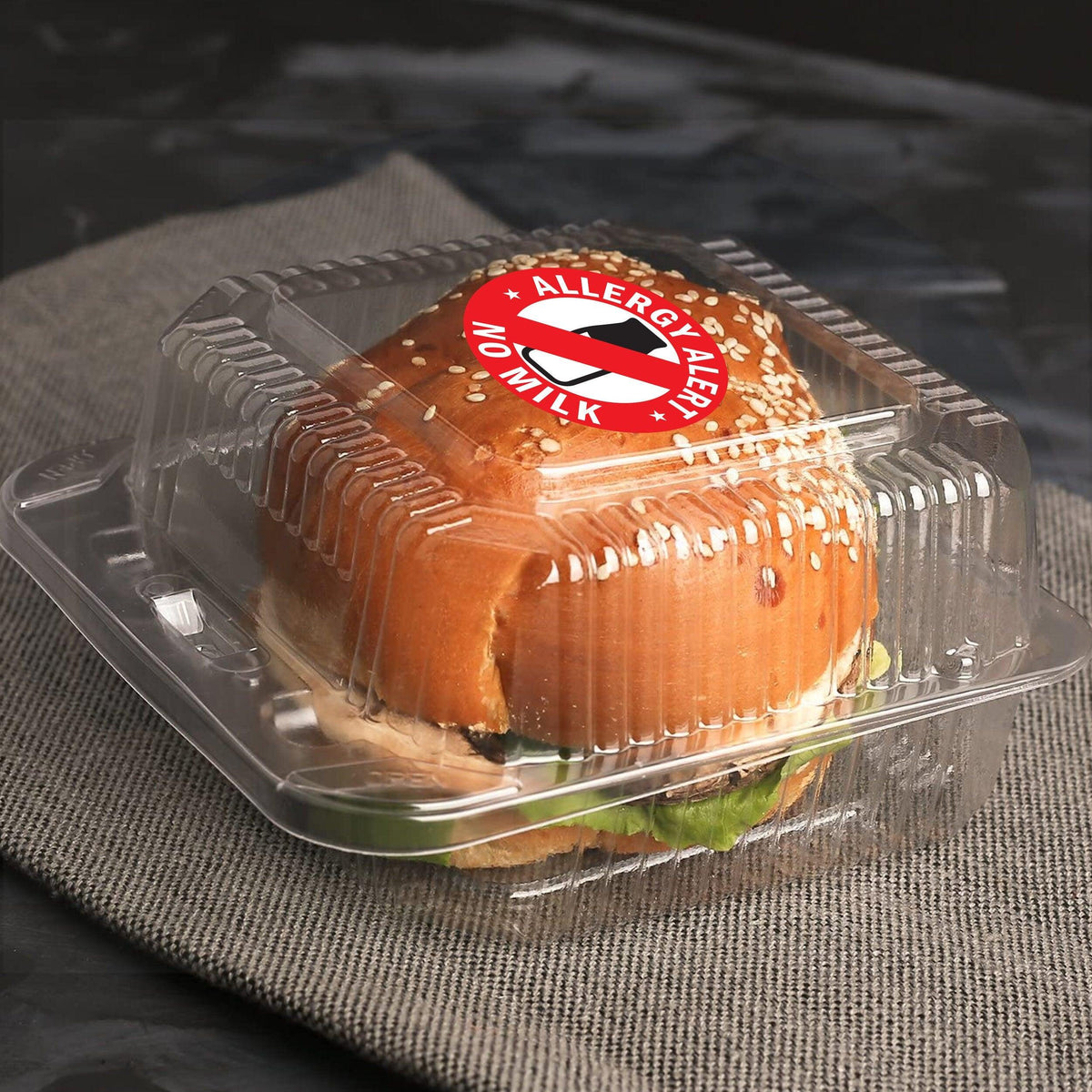 No Milk Allergy Alert Sticker on a sandwich container, promoting food allergy safety and awareness.