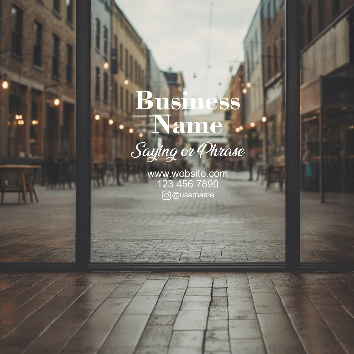 Custom window decal displaying business name and contact info on storefront glass.