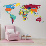 Colorful world map vinyl decal on wall, featuring country names.