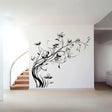 Elegant flowers wall decals on a white wall, transforming the living room with nature-inspired vinyl stickers.