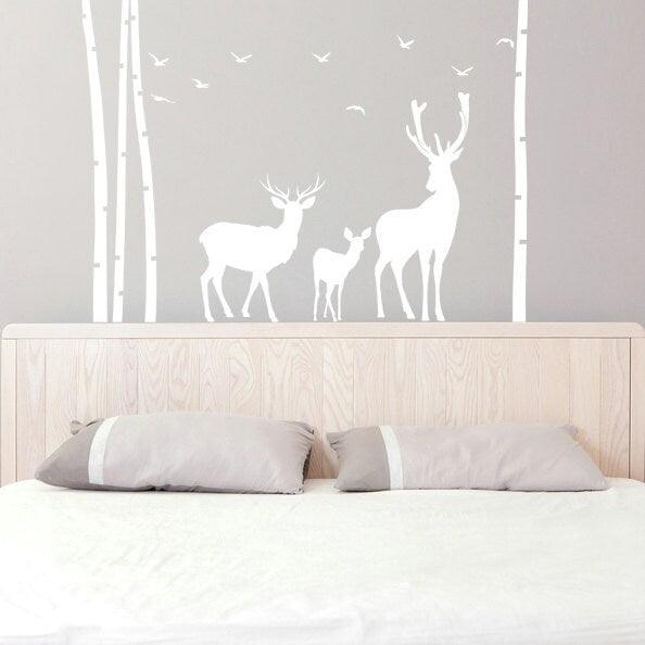 Deer wildlife wall vinyl sticker design featuring a deer family with antlers and trees.