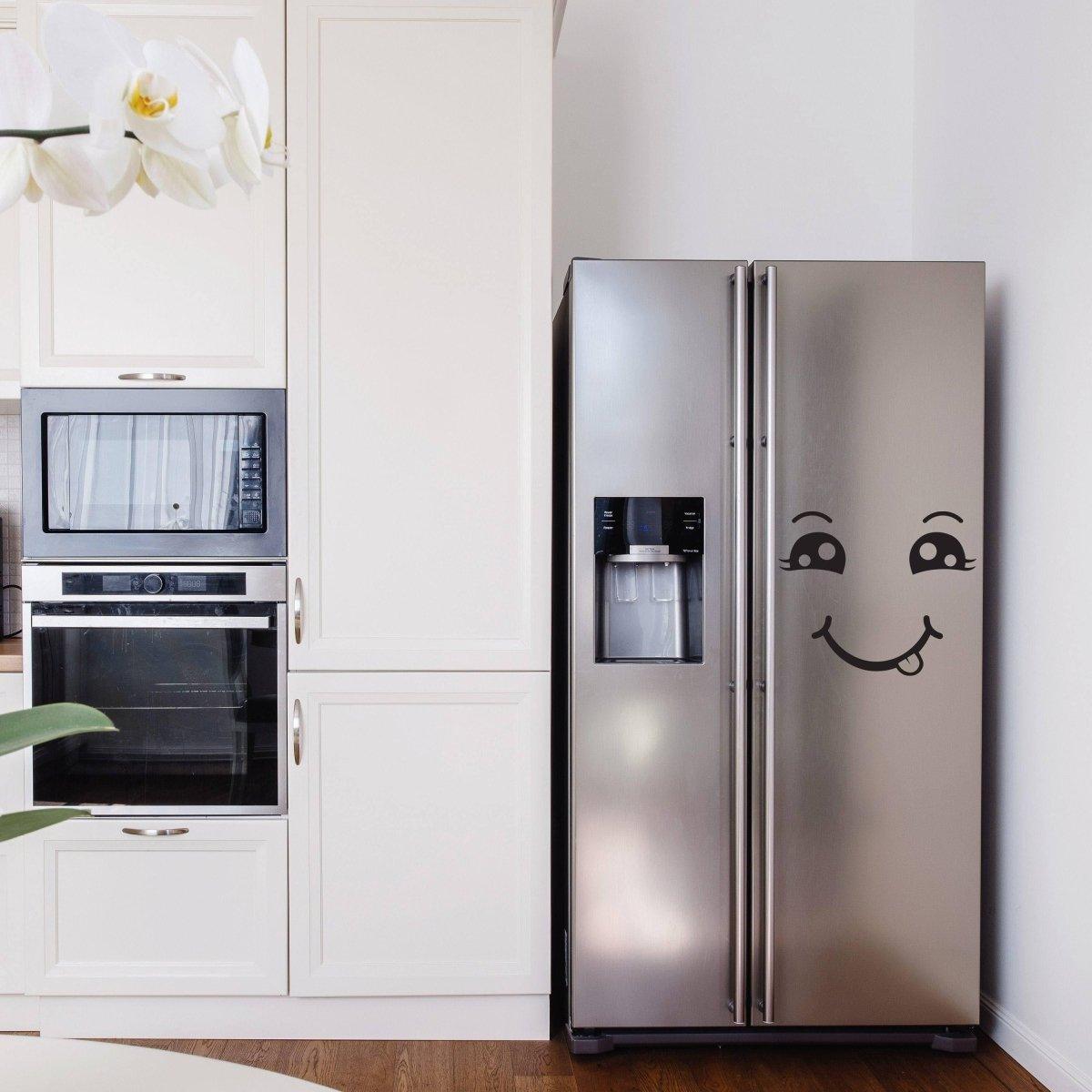 Happiness wall decal sticker featuring a smiling face on a stainless steel refrigerator in a modern kitchen.