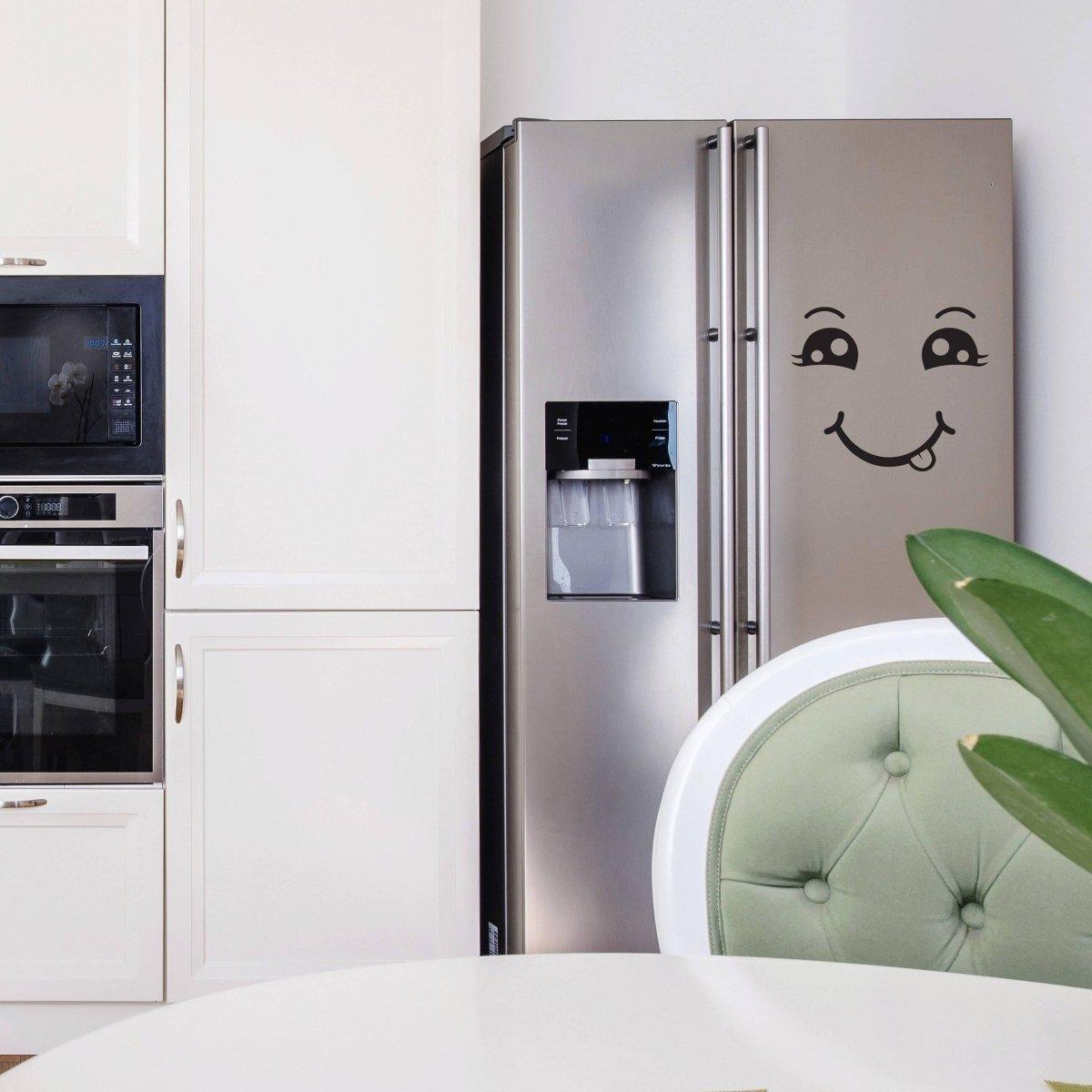 Happiness wall decal sticker of a smiling face on a stainless steel fridge in a modern kitchen setting.