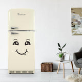 Cute smiley face decal on retro beige fridge in a stylish kitchen setting, adding happiness to home decor.
