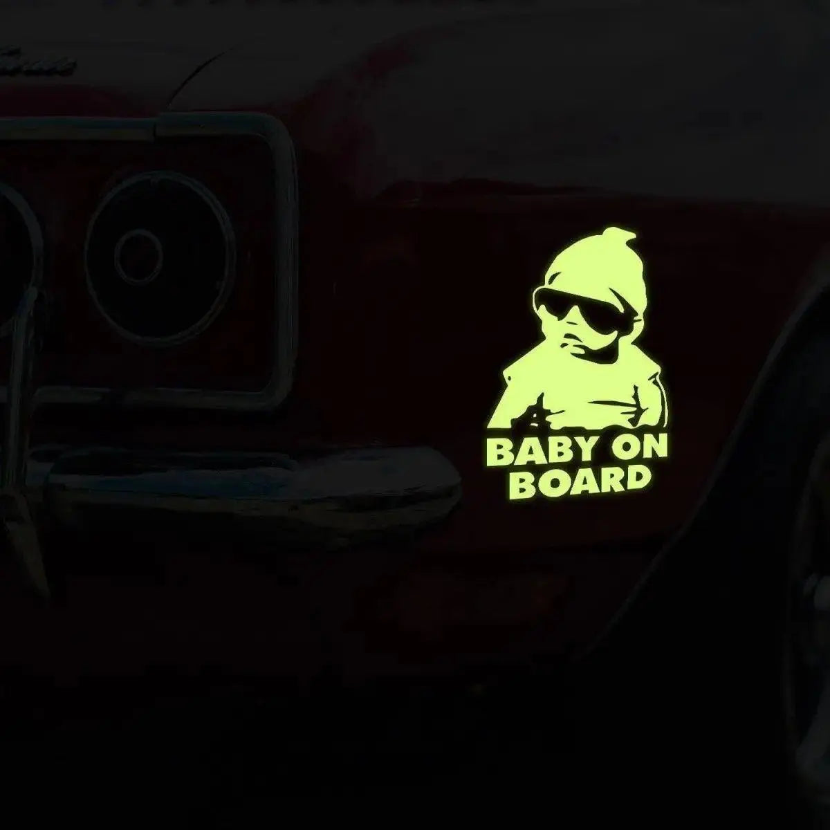 Glowing baby on board car decal, luminescent safety sticker for vehicles, adds visibility and style.