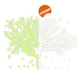 Glow-in-the-dark tree wall decal featuring vibrant green and white leaves for children's room decor.