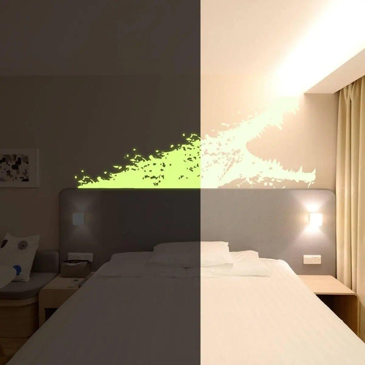 Luminous glow-in-the-dark alligator wall decal illuminating a bedroom, showcasing a magical nighttime effect.