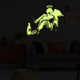 Glowing Guardian Angel wall sticker in luminescent green design on a dark wall, enhancing home decor with spiritual art.