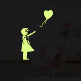 Girl silhouette reaching for a glowing heart balloon decal in a cozy room.