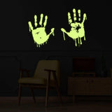 Luminous zombie blood wall decal featuring glowing bloody hands on a dark wall.